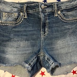 Miss Me cutoff’s, bought like this. Blue jeans, size 30